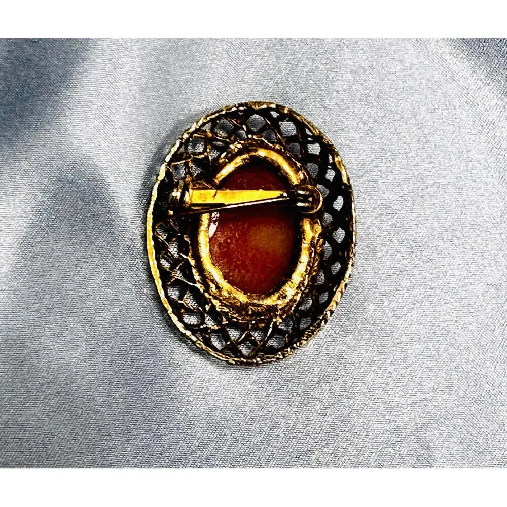 Vintage Light Red Stone w/ Right Facing Cameo on Bronze Basket Weave Trim Brooch